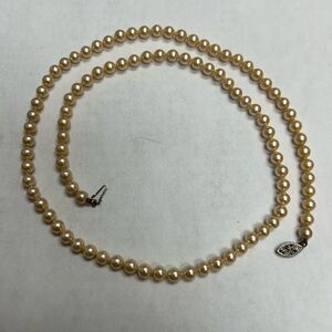 Elegant 24” Cream Pearl Necklace with Sterling Silver Clasp.